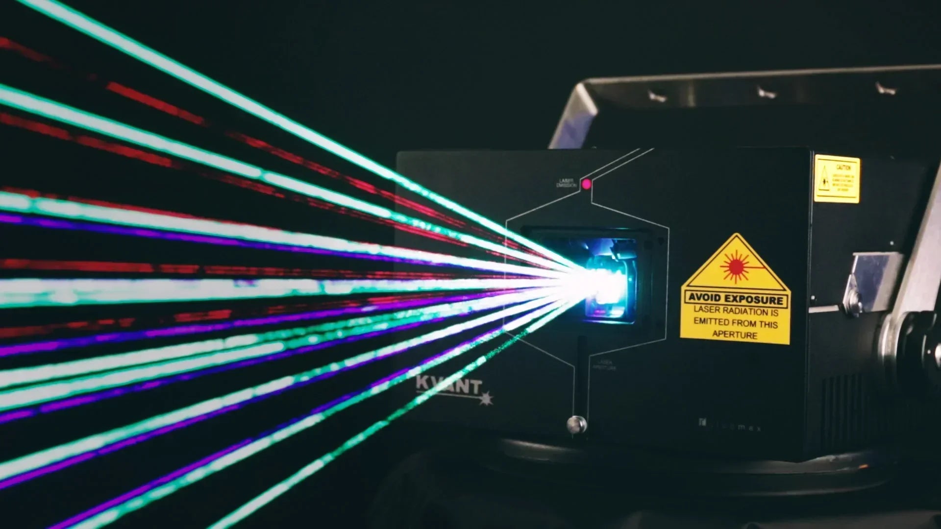 Laser light show projector emitting laser to the left